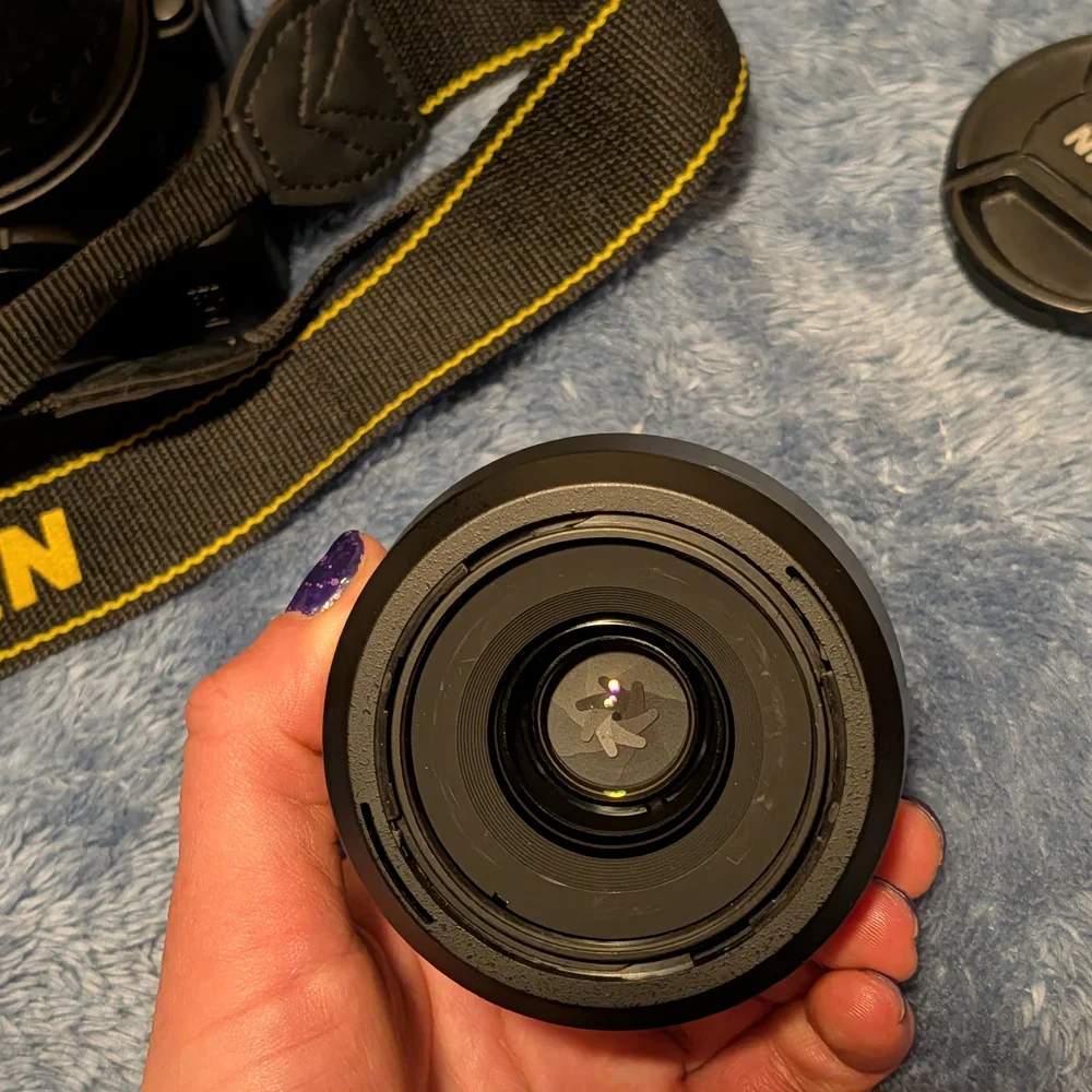 Nikon Black DSLR Camera with 4 Lenses